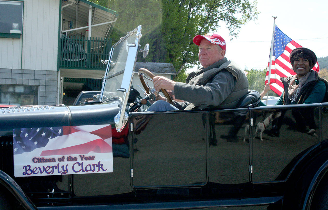 Brinnon Citizen of the Year Beverly Clark got first-class treatment in a classic car near the front of the Loyalty Day Parade route Friday in Brinnon. (Brian McLean/Peninsula Daily News)