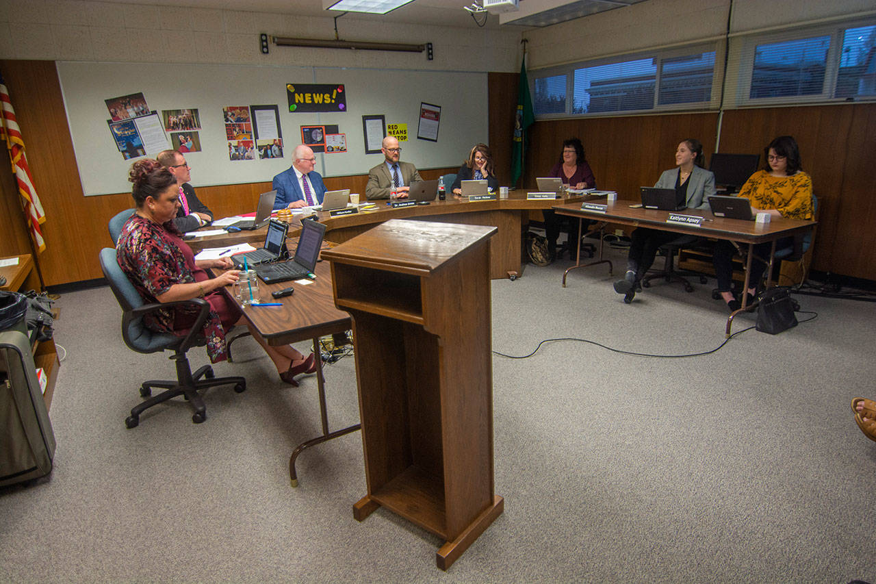 The Port Angeles School Board of Directors approved the adoption of a reduced education program for next school year, a plan that will cut 21.68 full time equivalent employees and 72 hours of paraeducators. (Jesse Major/Peninsula Daily News)