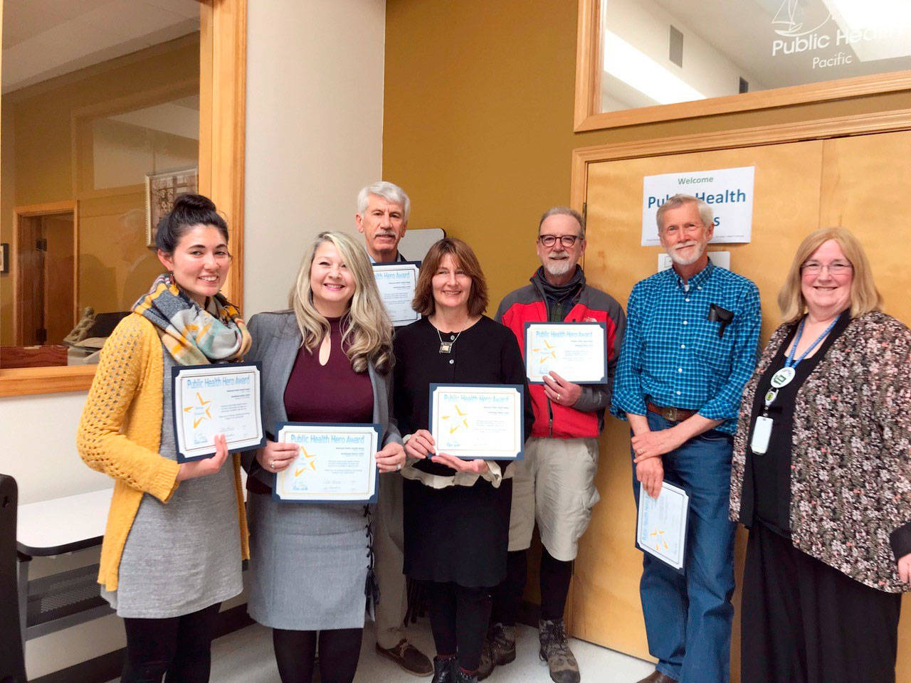 Jefferson County Public Health’s 2019 Health Heroes, from left, are Teresa Shiraishi, Dove House; Julie Iszley, Washington Health Care Authority; Bob Bindschadler, Climate Action Group Local 20/20; Susan O’Brien, Jefferson County Public Health; Dace Thielk, The Recyclery; Kees Kolff, Jefferson County Board of Health; and Vicki Kirkpatrick, director of Jefferson County Public Health. Owen Fairbank is not shown.