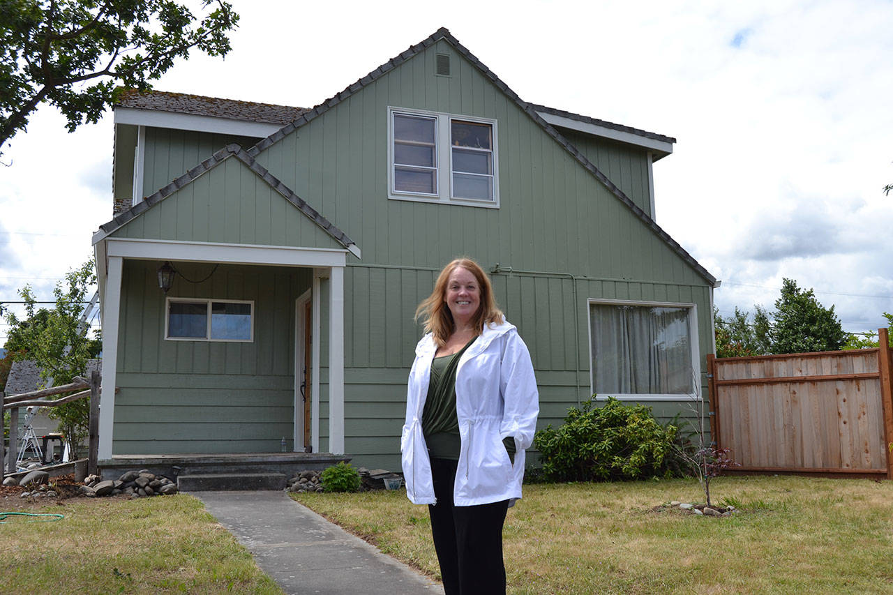 Last summer, volunteers helped Laraine Claire paint her home on the corner of Spruce Street and Fourth Avenue for Sequim Service Fest. On April 27, volunteers with Sequim Beautiful Day helped paint the interior. (Matthew Nash /Olympic Peninsula News Group)                                Last summer, volunteers helped Laraine Claire paint her home on the corner of Spruce Street and Fourth Avenue for Sequim Service Fest. On April 27, volunteers with Sequim Beautiful Day helped paint the interior. (Matthew Nash/Olympic Peninsula News Group)