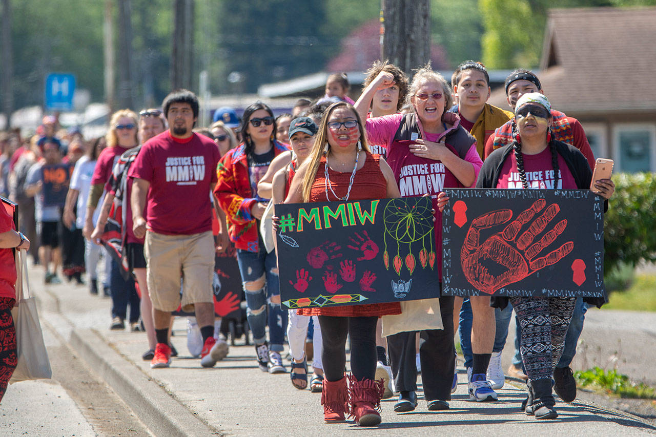 About 200 people representing coastal tribes across the Olympic Peninsula marched in downtown Forks on Sunday for the national day of awareness for Missing and Murdered Indigenous Women. (Jesse Major/Peninsula Daily News)