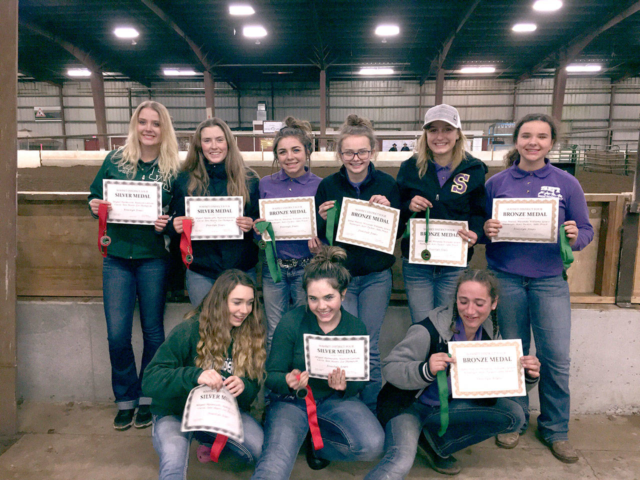 Port Angeles and Sequim’s high school equestrian Freestyle-fours drill teams each earned medals. From Port Angeles, Cassi Ann Moore, Abby Hjelmeseth, Madison Carlson and Zoe Thompson won gold. From Sequim, Keri Tucker, Miranda Williams, Grace Niemeyer, Yana Hoesel and Abbi Priest won the bronze. These medals contributed to overall points during the three district-qualifying meets of the season, which means both teams will be competing at the upcoming state finals. (Katie Newton)