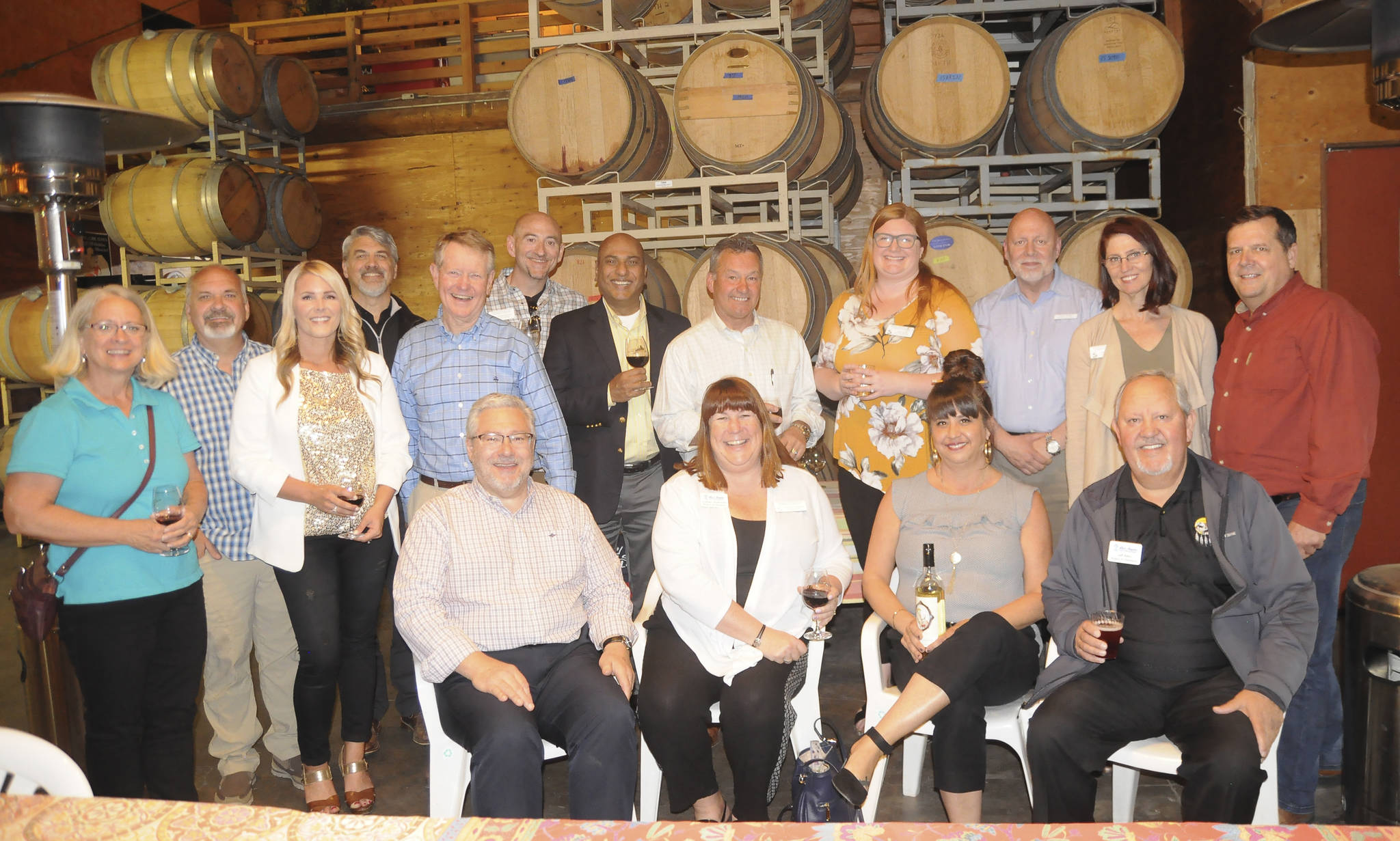 Members of the Port Angeles Chamber of Commerce and Sequim-Dungeness Valley Chamber of Commerce get together for a joint meeting at Olympic Cellars Winery on Monday. (Michael Dashiell/Olympic Peninsula News Group)