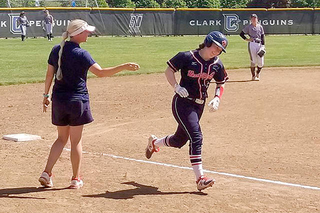 Dave Andrew/Lower Columbia Softball Port Angeles’ Lauren Lunt rounds the bases after hitting a 3-run home run for Lower Columbia in a 7-5 win over Clark College. Lunt hit three home runs on the day for the Red Devils.