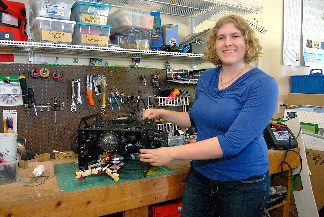 Ella Ashford, at a robotics workbench, promotes STEM in the area. (Keith Thorpe/Peninsula Daily News)