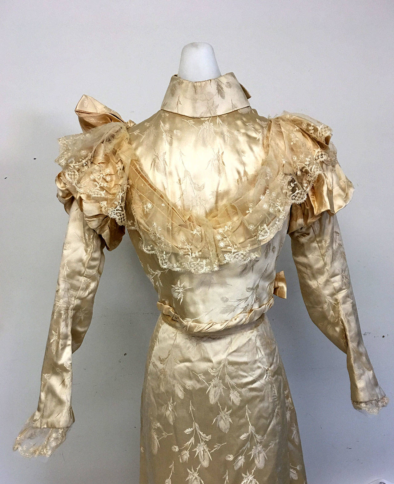 This historic gown is the wedding suit that belonged to Caroline Jones Rixon.