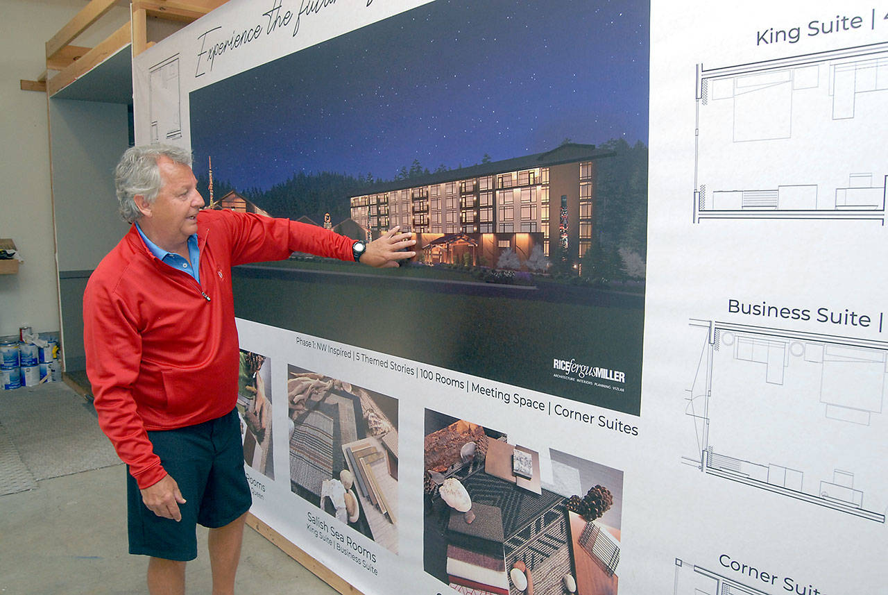 7 Cedars Casino CEO Jerry Allen looks at an artist’s rendering of the casino’s new resort hotel curently under construction. (Keith Thorpe/Peninsula Daily News)