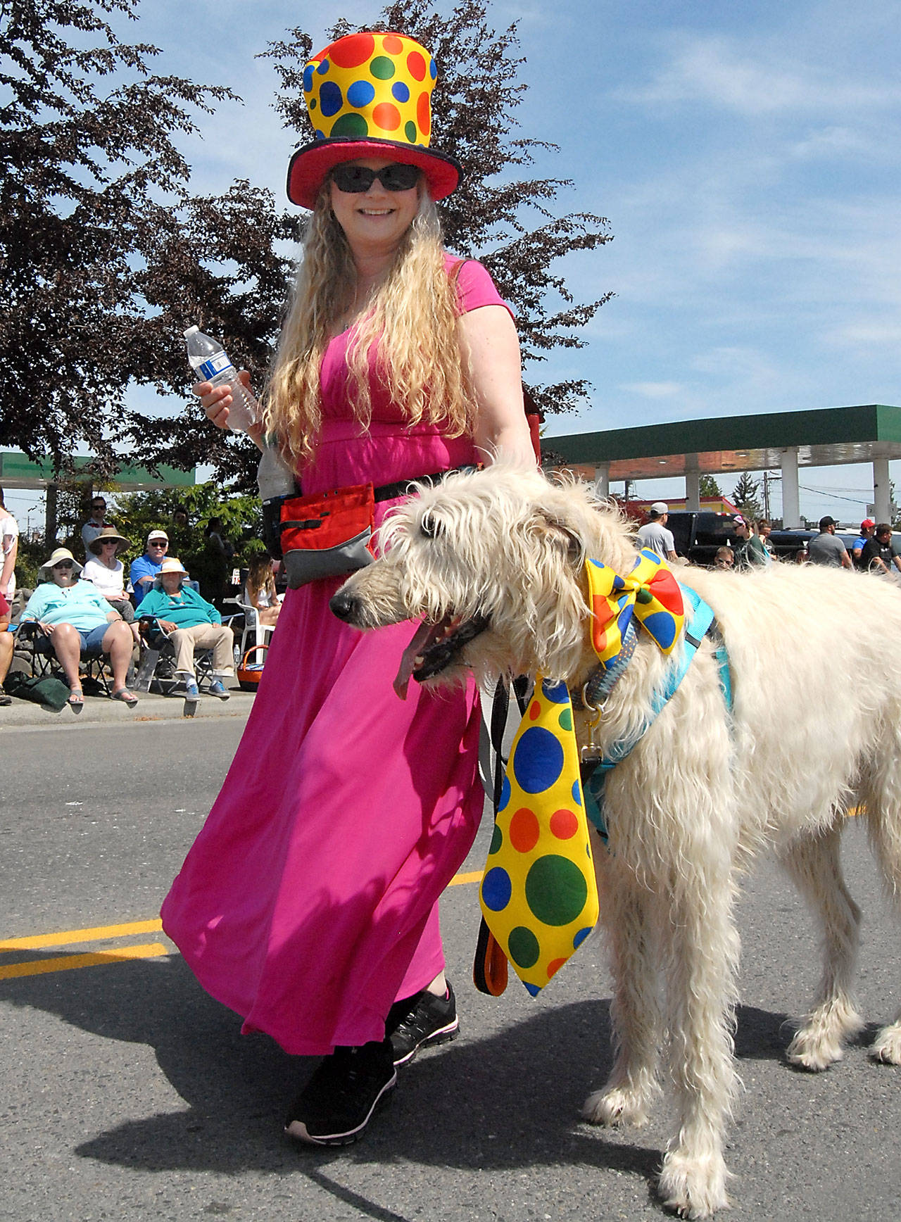 Rebekah Jordan and her dog, Lincoln, take their turn in Saturday’s Grand Parade. (Keith Thorpe/Peninsula Daily News)