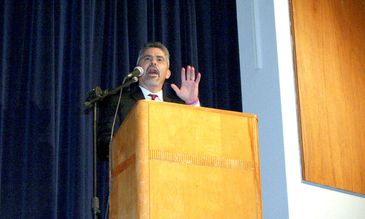 State Supreme Court Justice Steven Gonzalez speaks Monday morning during an assembly of 200 Chimacum High School students at the school’s auditorium. Gonzalez covered his background and job duties, and he answered questions from the audience. (Brian McLean/Peninsula Daily News)