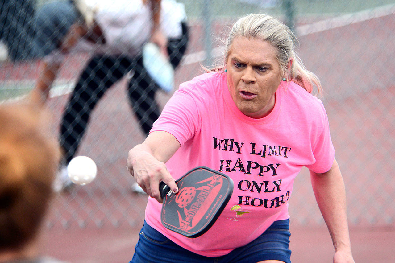 Cynthia Stapleford of Richmond, Va., plays pickleball during Esprits community pickleball tournament Monday. (Jesse Major/Peninsula Daily News)