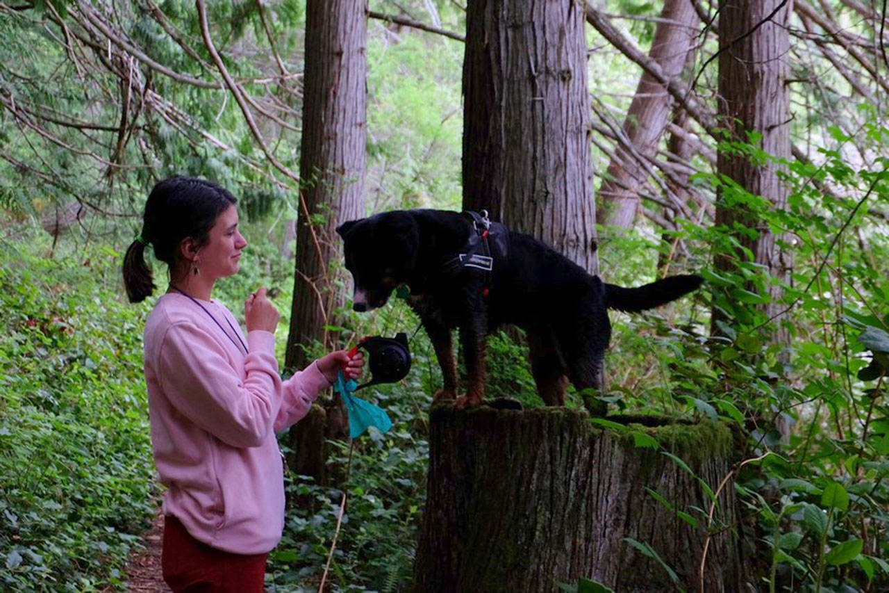 Yunue Moore is seen with her dog Clue at Anderson Lake State Park. (Teresa Moore)