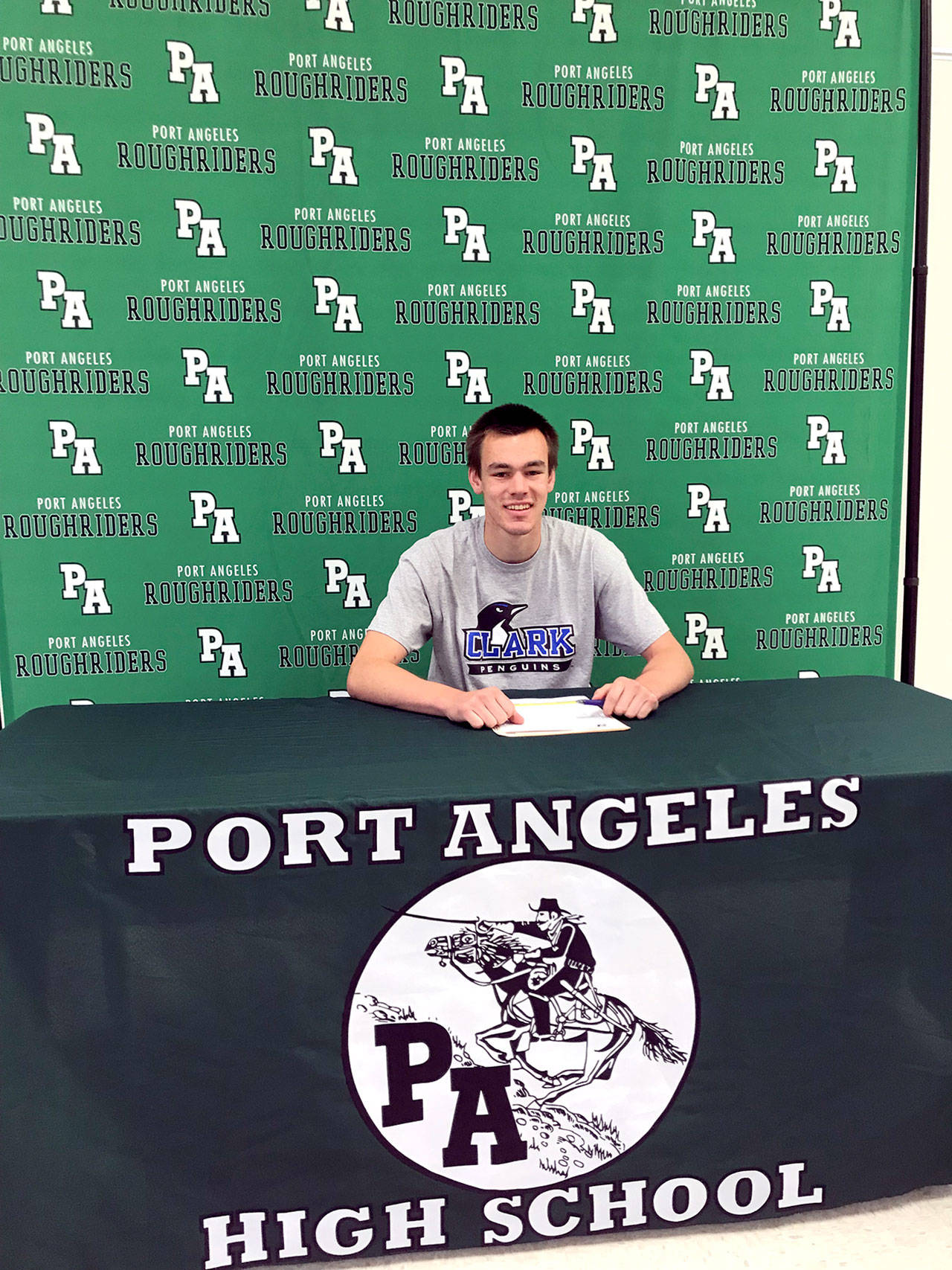 Port Angeles’ Liam Clark signed a letter of intent Thursday to play basketball at Clark College in Vancouver. Clark also intends to compete in track and field for the Penguins.