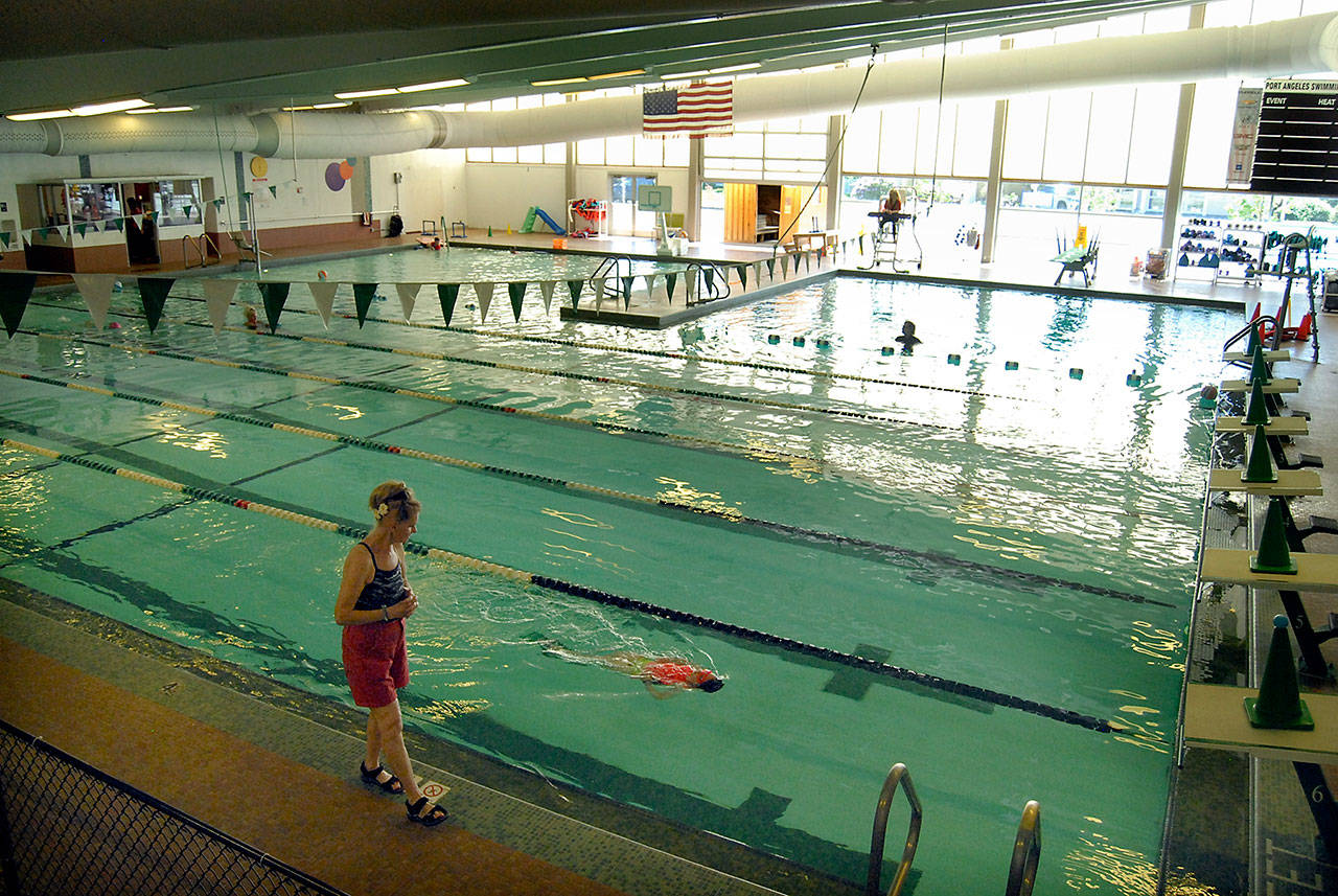 Swimming lessons and therapy sessions continue at William Shore Memorial Pool in Port Angeles on Wednesday as the pool goes into its last days of operation before being demolished to make way for a new aquatic center. (Keith Thorpe/Peninsula Daily News)