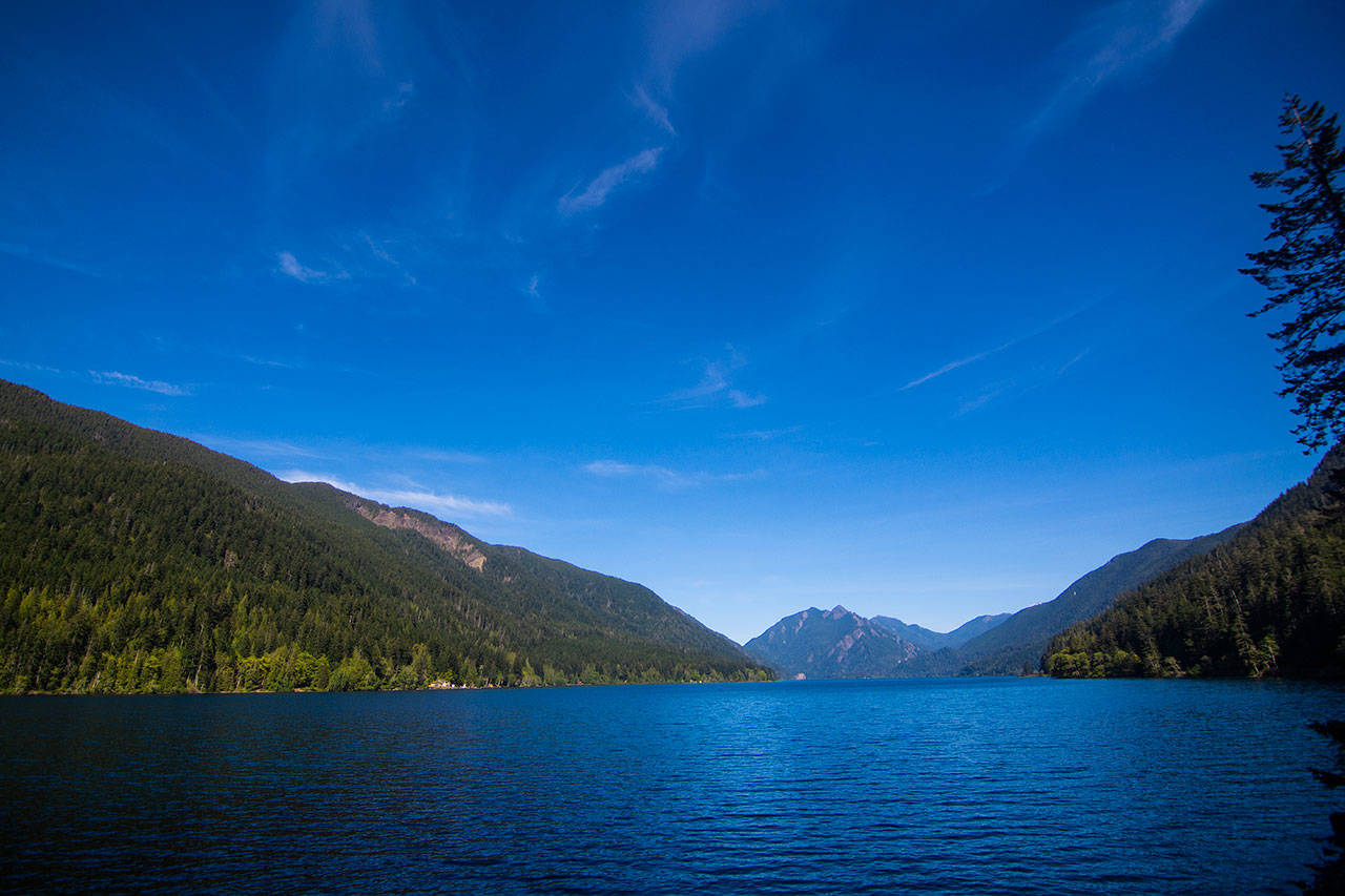 Eighty percent of the vehicles that pass Lake Crescent in Olympic National Park in August are considered to be entering the park for recreational use, while 20 percent of the vehicles that do so in the winter are tallied in visitation statistics. (Jesse Major/Peninsula Daily News)