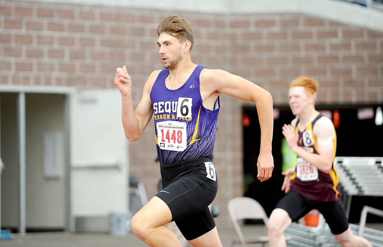 Sequim’s Alec Shingleton runs in the 400-meter preliminaries Thursday at the 2A state track and field championships at Mount Tahoma High School in Tacoma. Shingleton finished second in the 400 and fifth in the 800. (Michael Dashiell/Olympic Peninsula News Group)