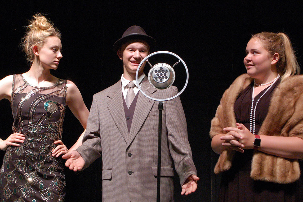 Lina Lamont and Don Lockwood (Mia Coffman and Dean Rynearson), from left, respond to questions from Dora Bailey (Cadence Puhrmann) during a rehearsal of the Olympic Peninsula Academys production of Singin In The Rain Jr. (Conor Dowley/Olympic Peninsula News Group)