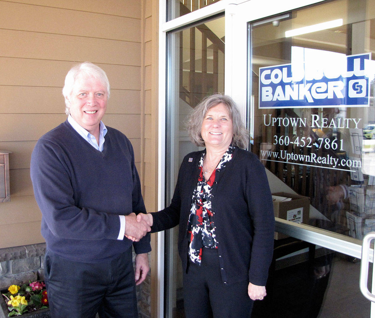 Jim Wahlsten welcomes new co-owner Lynn Bedford. (Coldwell Banker)