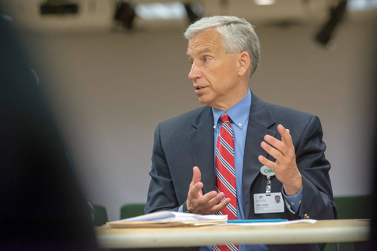 Olympic Medical Center CEO Eric Lewis discusses changes at the hospital that are expected to decrease wait times at the Emergency Department. (Jesse Major/Peninsula Daily News)