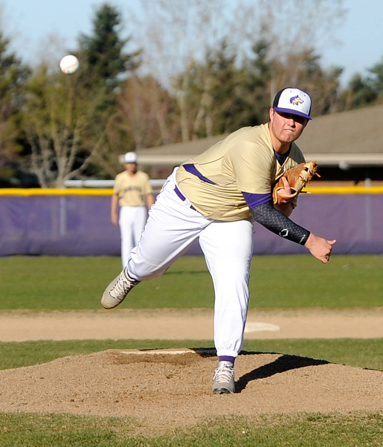 Michael Dashiell/Olympic Peninsula News Group Sequim’s Johnnie Young pitches during an early season game against North Mason.