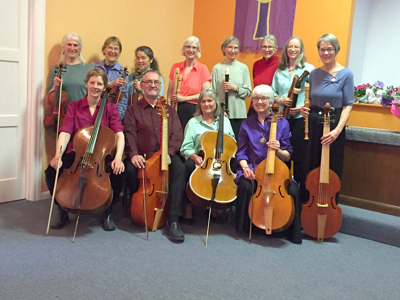 The Port Townsend Ladies Orchestra and Benevolent Society is tuning up for a concert Sunday. In the back row are Marcy Stewart, Kristin Smith, Jane Steussy, Louise Huntingford, Beatrix Dobyns, Pat Yearian, Barbara Tusting and Dahti Blanchard. In the front are Martha Breunig, Lee Inman, Gretchen Cooper and Diane Vaux.