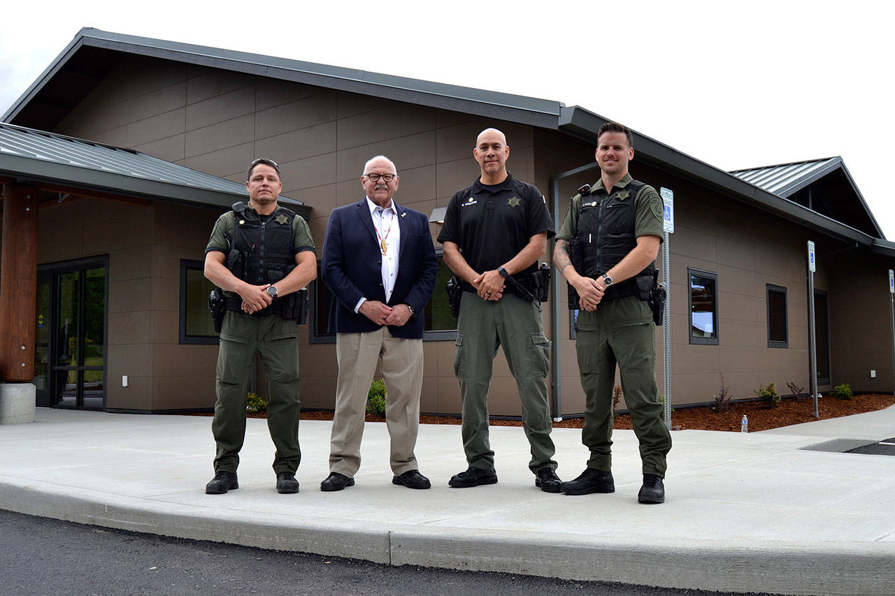 The new Public Safety and Justice Center for the Jamestown S’Klallam Tribe offers bigger space for tribal officers Patrick Carter, left, Police Chief Rory Kallappa and Jason Robbins. Ron Allen, Jamestown tribal chairman and CEO, second from left, said “when people come here whether for a case or any regard with a judicial or public safety matter, they know they’re walking into a place that reflects professionalism and integrity of a quality law enforcement system.” Matthew Nash/Olympic Peninsula News Group