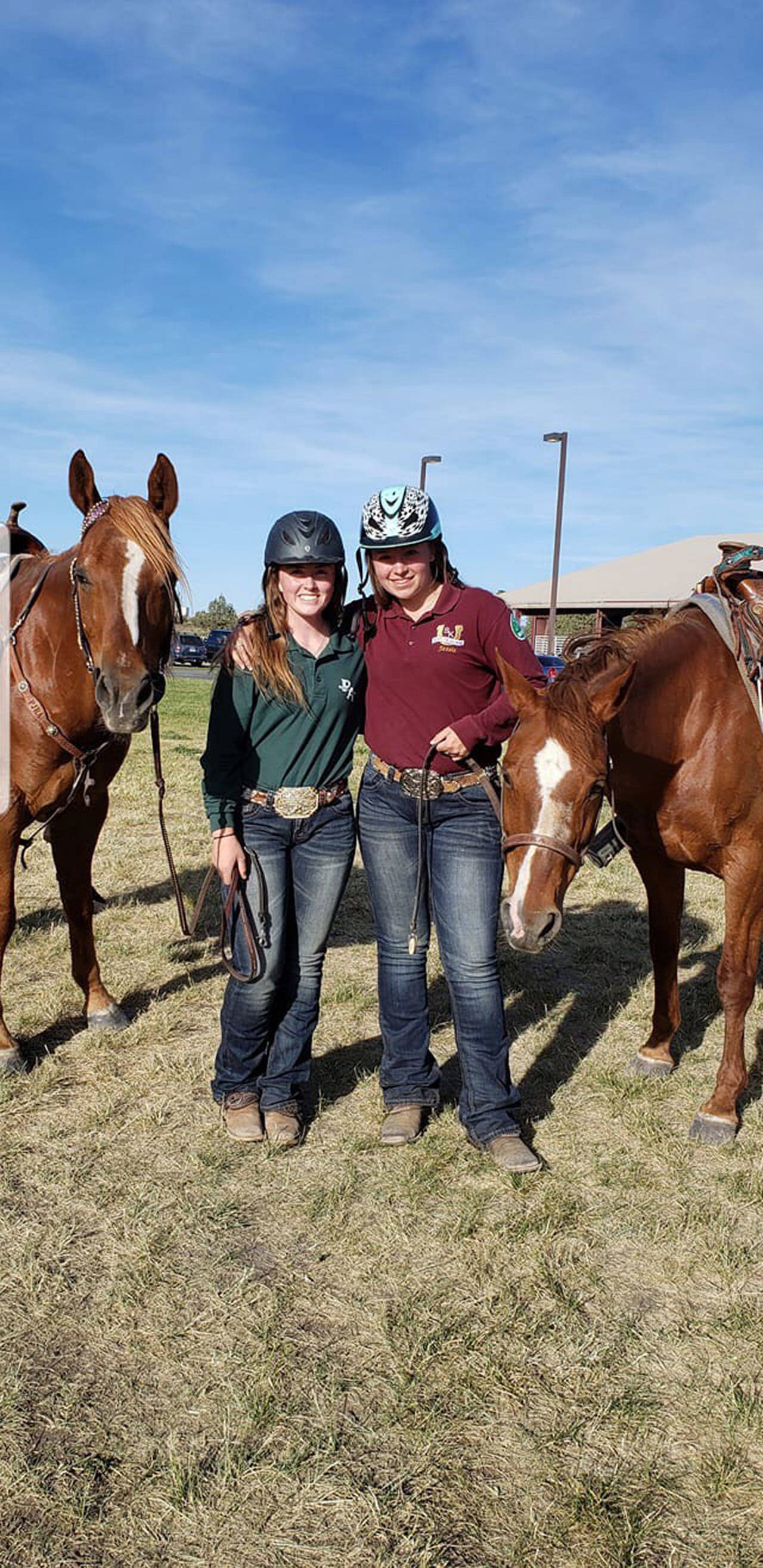 Port Angeles’ Cassi Ann Moore, left, is shown with friend and fellow competitor Jessie Ferrington, after winning the gold medal in pole bending at the Pacific Northwest Invitational Championship in Redmond, Ore., last weekend. (Bethel Moore)