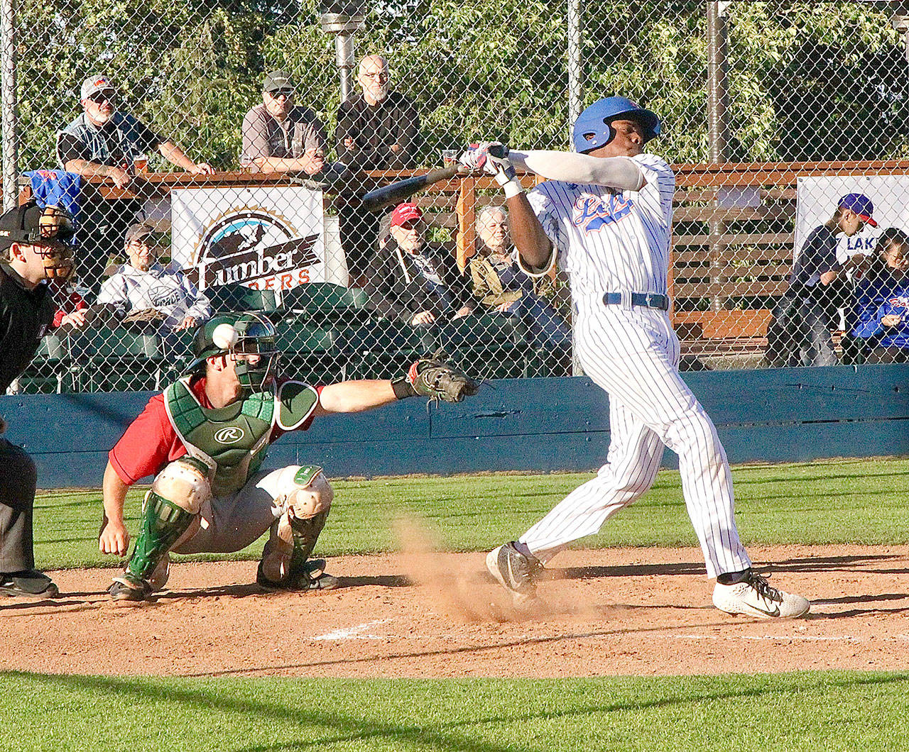 The Lefties’ Nick Berry fouls off a pitch from Wenatchee’s Ryan Long, who fired a shutout for seven innings in the AppleSox’s 7-3 win over the Port Angeles on Tuesday. (Dave Logan/for Peninsula Daily News)