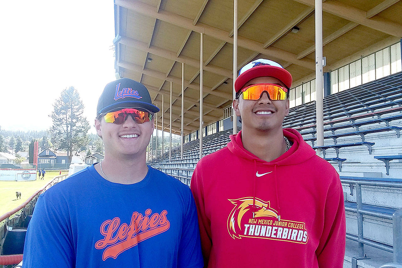 Jonny Chavez, left and A.C. Chavez aren’t related and never met before joining the Port Angeles Lefties. They’re both pitchers for the Lefties with a combined 32 strikeouts in 28 innings. (Pierre LaBossiere/Peninsula Daily News)