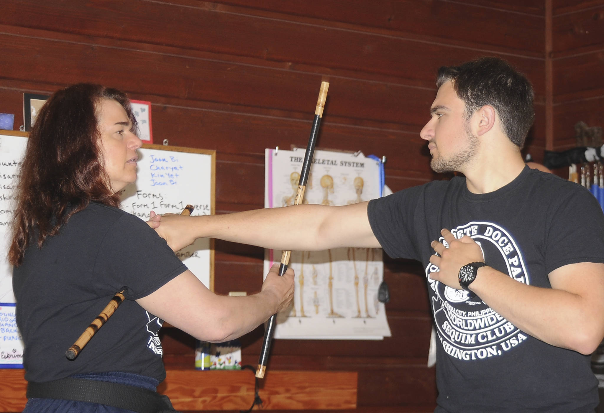 Kathrin Sumpter and son Sam Manders join a team of Americans competing and attending seminars at the 10th biannual Cacoy Cañete Doce Pares World Invitational Tournament and Gathering, held in Cebu City, Philippines, this August. Michael Dashiell/Olympic Peninsula News Group