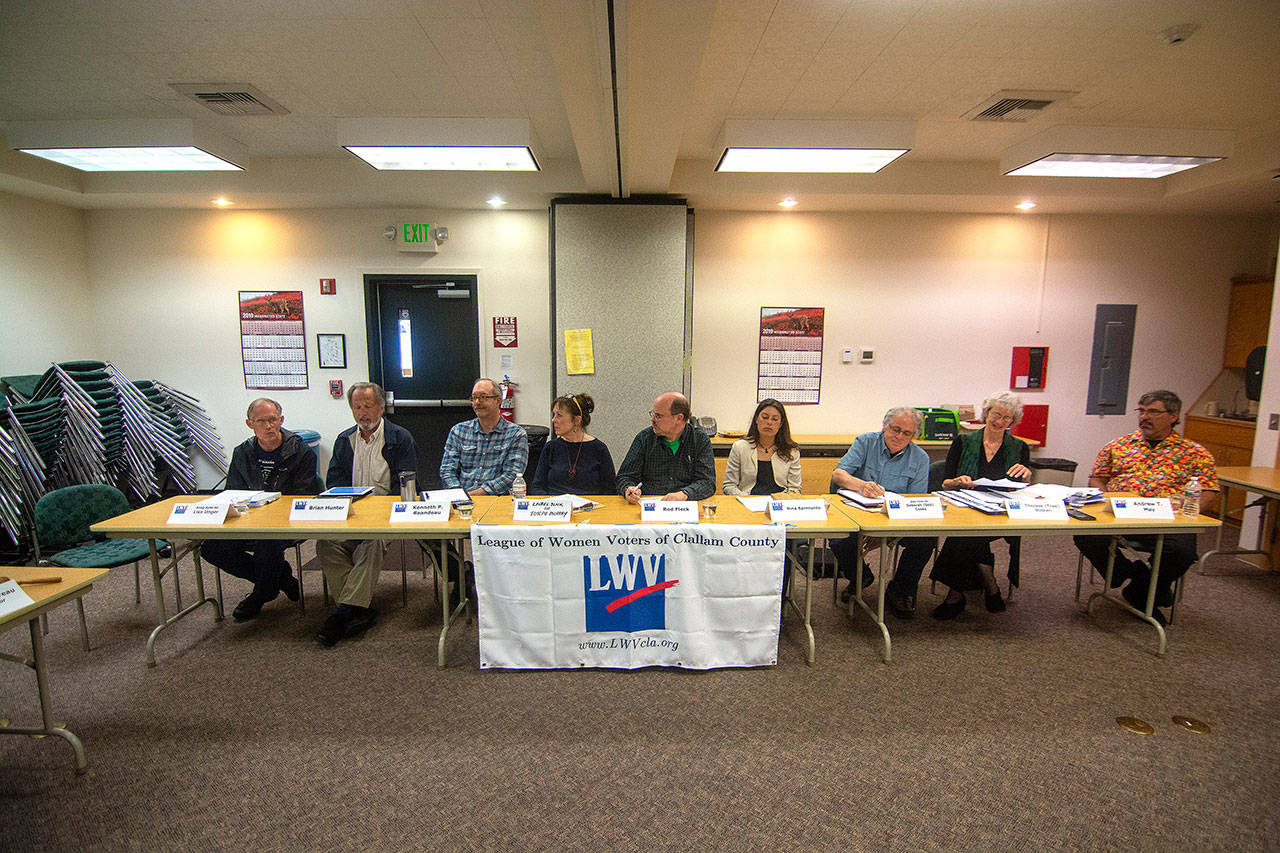 Candidates for Charter Review Commission, District 3, participate in a League of Women Voters forum in Forks on Tuesday. Candidates Brian Hunter, Kenneth Reandeau, Rod Fleck, Nina Sarmiento, Therese Stokan and Andrew May attended, while others either did not attend or sent surrogates. (Jesse Major/Peninsula Daily News)