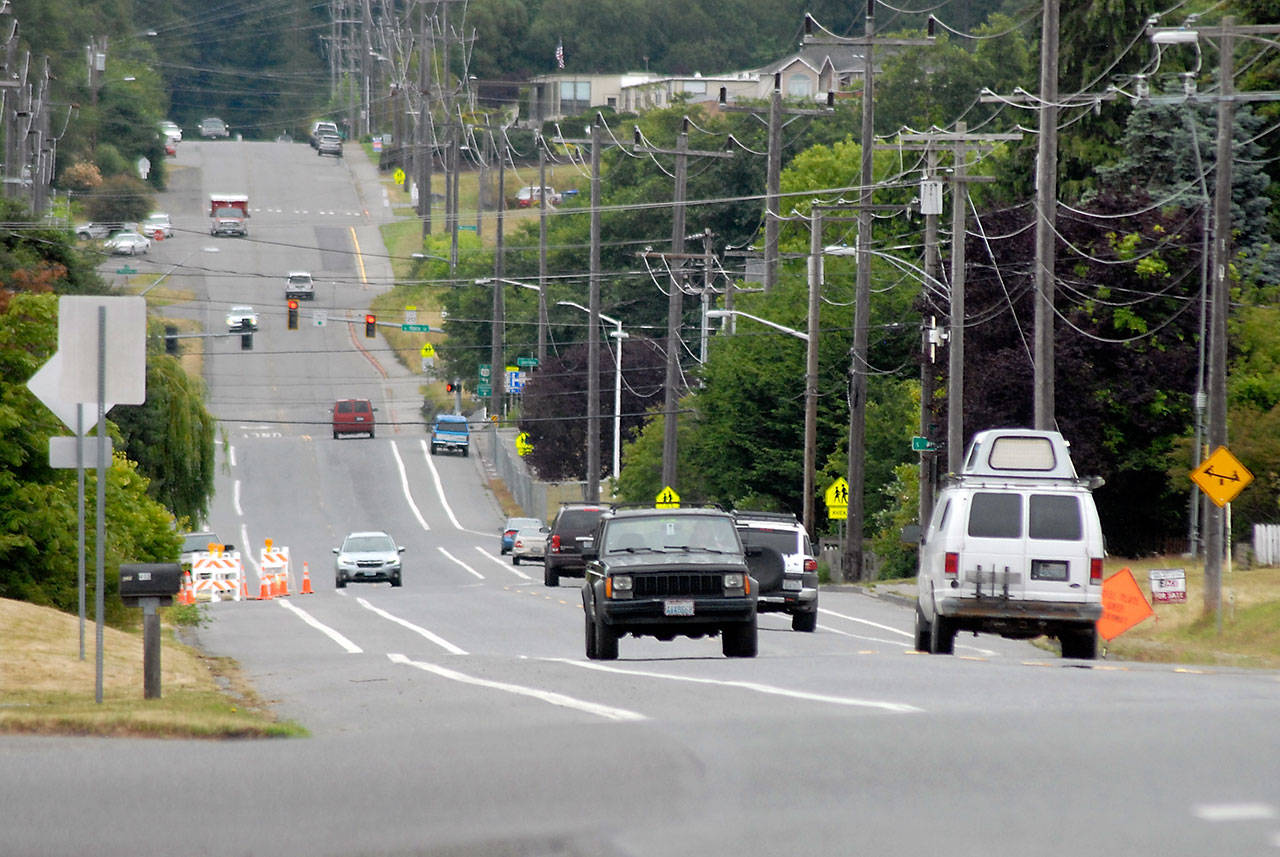 Vehicles make their way along a section of Lauridsen Boulevard in Port Angeles. The boulevard between Lincoln Street and Lauridsen Court is slated for repaving. (Keith Thorpe/Peninsula Daily News)
