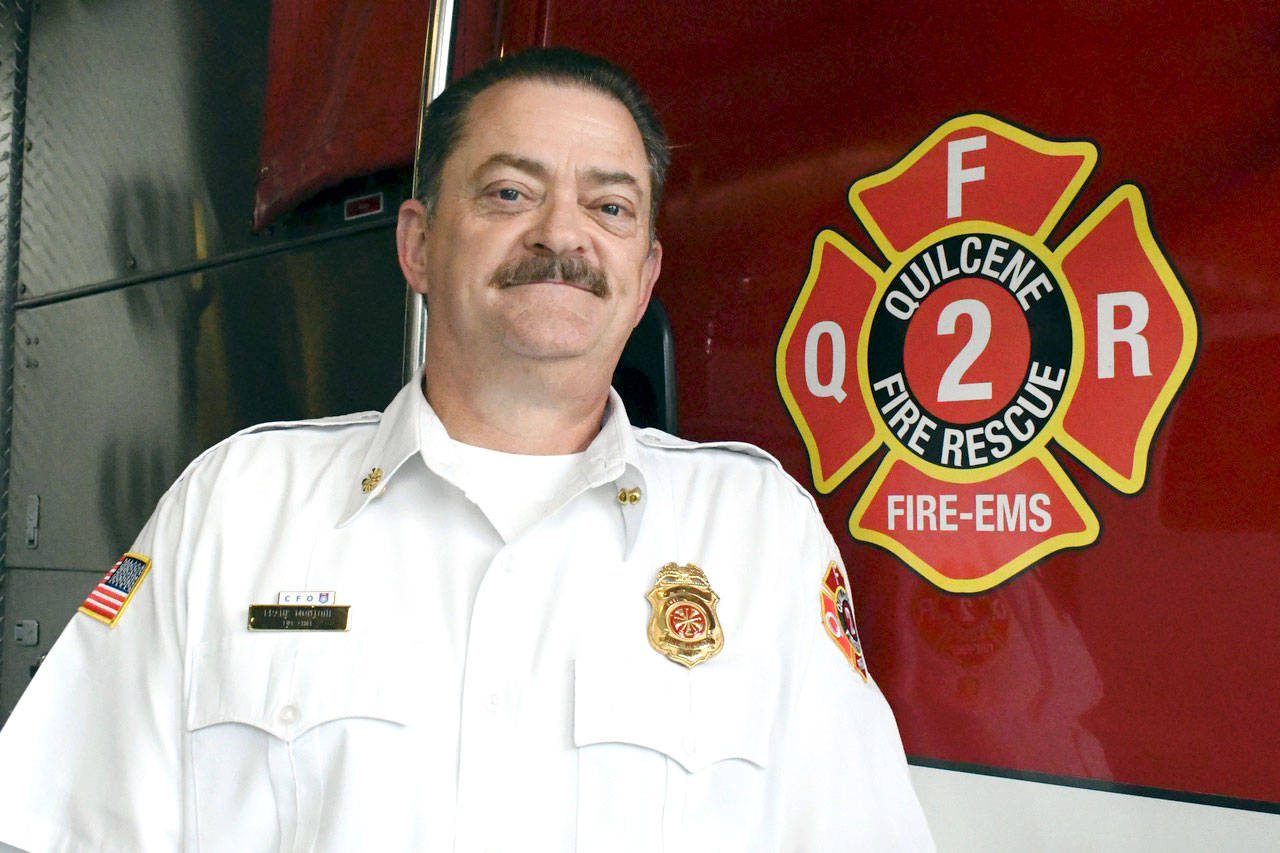 Frank Montone, whose career spanned the globe with the U.S. Department of Defense Fire and Emergency Services, has settled in as chief of Quilcene Fire Rescue. (Jeannie McMacken/Peninsula Daily News)