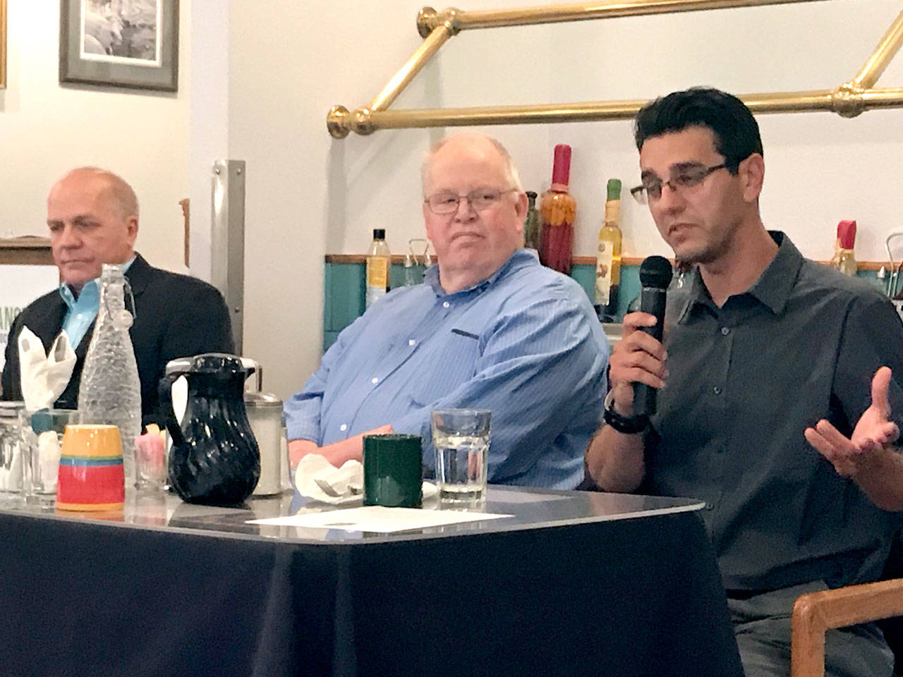 Port Angeles City Council candidates Artur Wojnowski, right, Richard “Doc” Robinson, center, and Charlie McCaughan aired their views Tuesday at a primary election forum. (Paul Gottlieb/Peninsula Daily News)