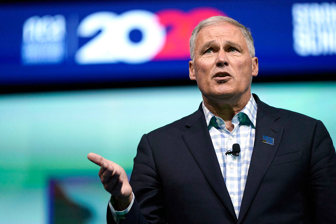 Democratic presidential candidate Gov. Jay Inslee speaks in Houston on July 5. Inslee says he opposes a plan to build an oil pipeline tunnel beneath the channel that links Lakes Huron and Michigan. (David J. Phillip/The Associated Press)