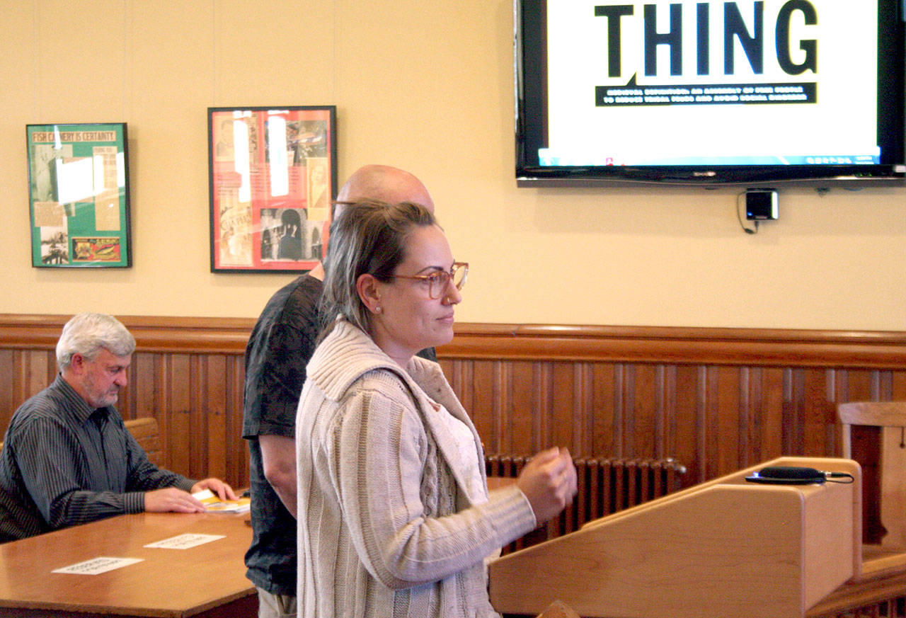 Nadia Quitslund, booking and sales manager for Seattle Theatre Group, addresses the Port Townsend City Council during a presentation Monday. Accompanied by Theatre Manager Mason Sherry, they spoke about potential impacts to city residents during the two-day Thing event Aug. 24-25 at Fort Worden. (Brian McLean/Peninsula Daily News)