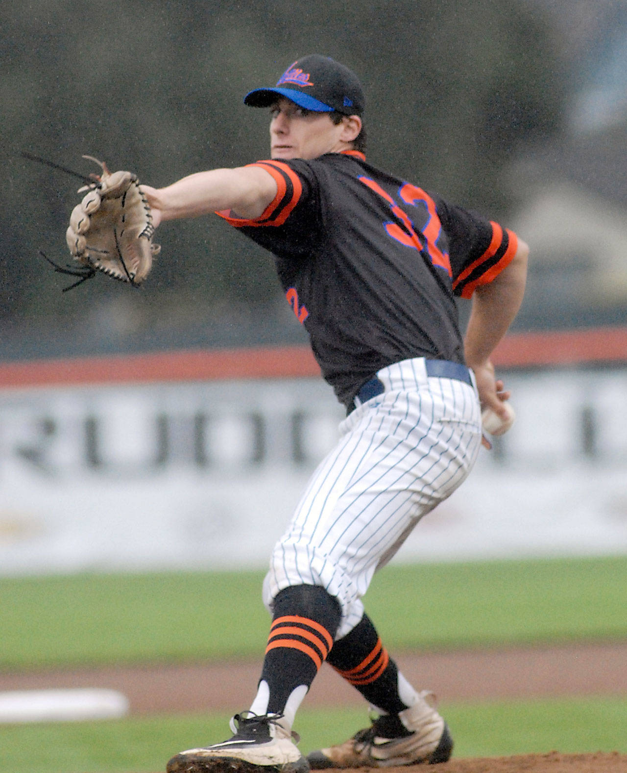 Lefties pitcher Joe Kinsky thows in the first inning against the Cowlitz Bears on a drizzly Wednesday at Port Angeles Civic Field. Kinsky took a no-hitter into the seventh inning.                                 Keith Thorpe/Peninsula Daily News