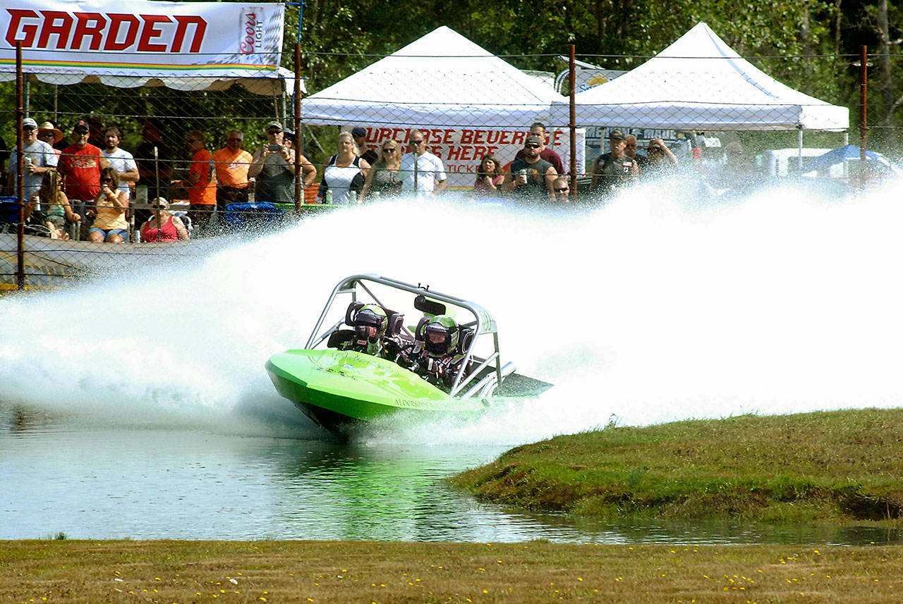 Keith Thorpe/Peninsula Daily News The Wicked Racing No. 1 boat driven by Doug Hendrickson and navigated by Nichole Heaton-Muller makes it way through the course in preliminary races in 2018 at Extreme Sports Park in Port Angeles.
