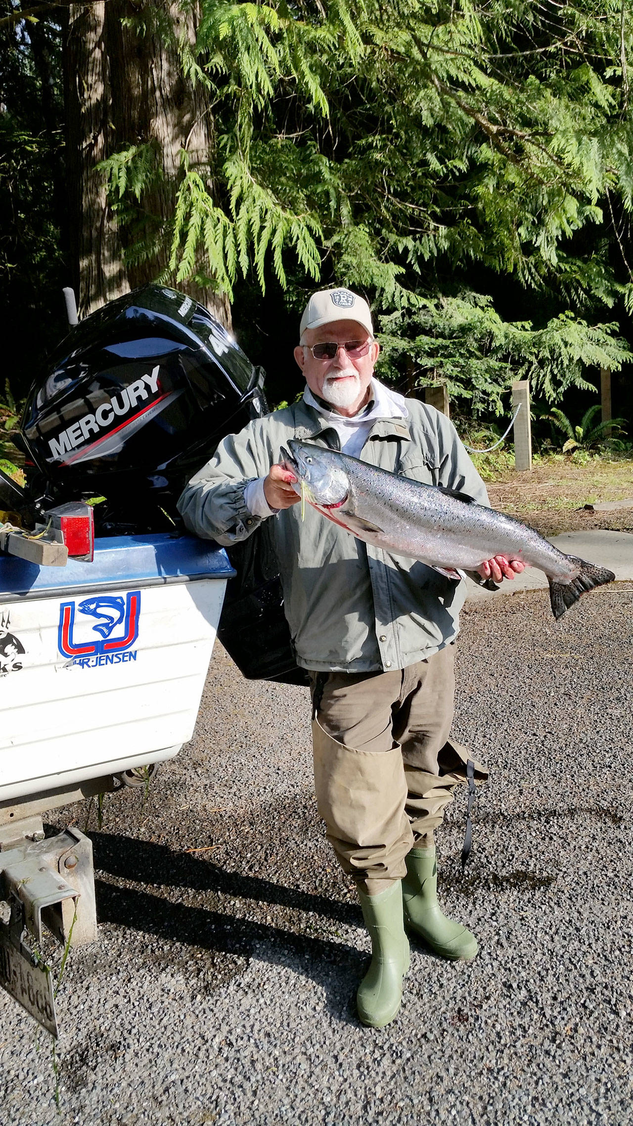 Pete Rosko Port Angeles angler Al Brown caught this 19.86-pound hatchery king on his first jig of a 1 1/2-ounce Natural Shad colored Kandlefish while fishing west of Tongue Point.