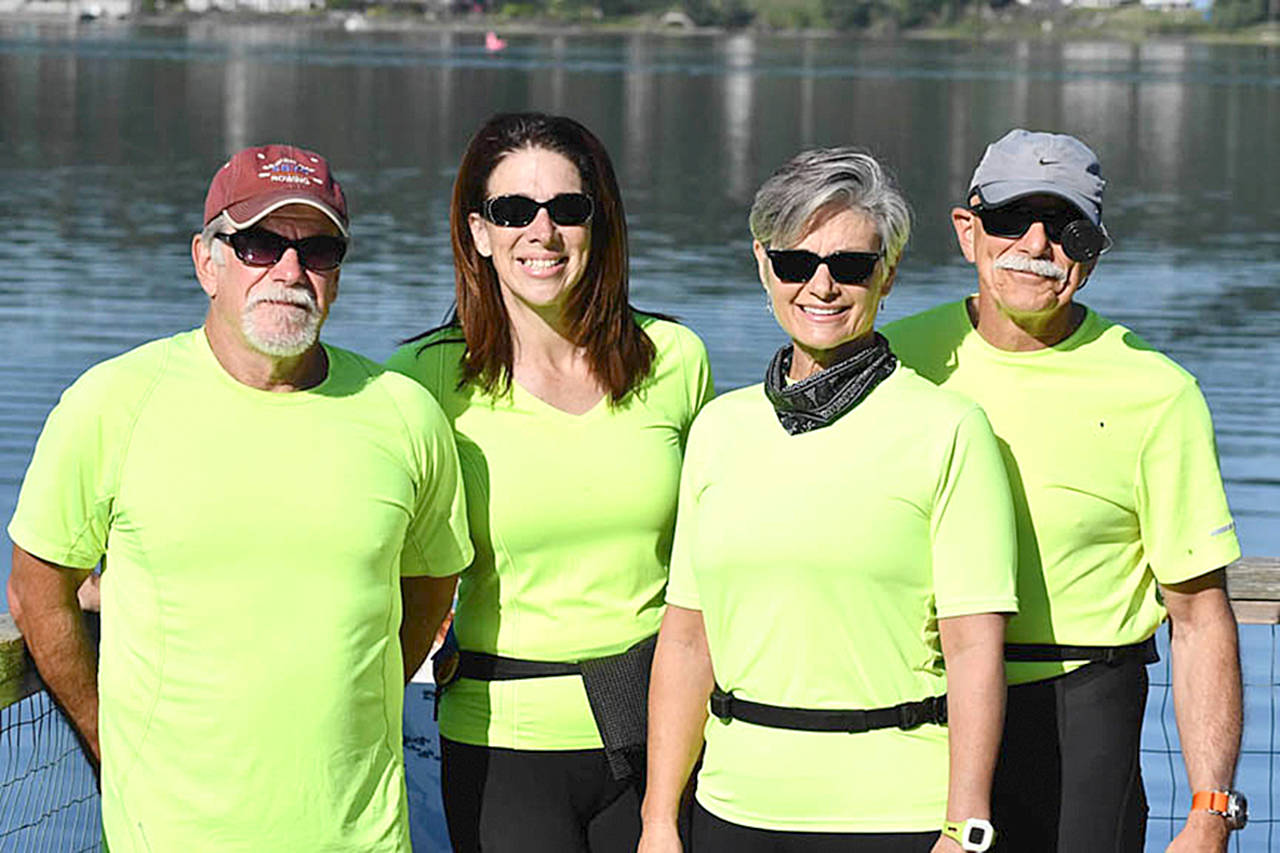Sequim Bay Yacht Club’s quad sculling team of, from left, Dennis Miller, Amy Holms, Carolyn DeSalvo and Frank DeSalvo recently competed at the Kitsap Invitational Summer Scrimmage on Liberty Bay.