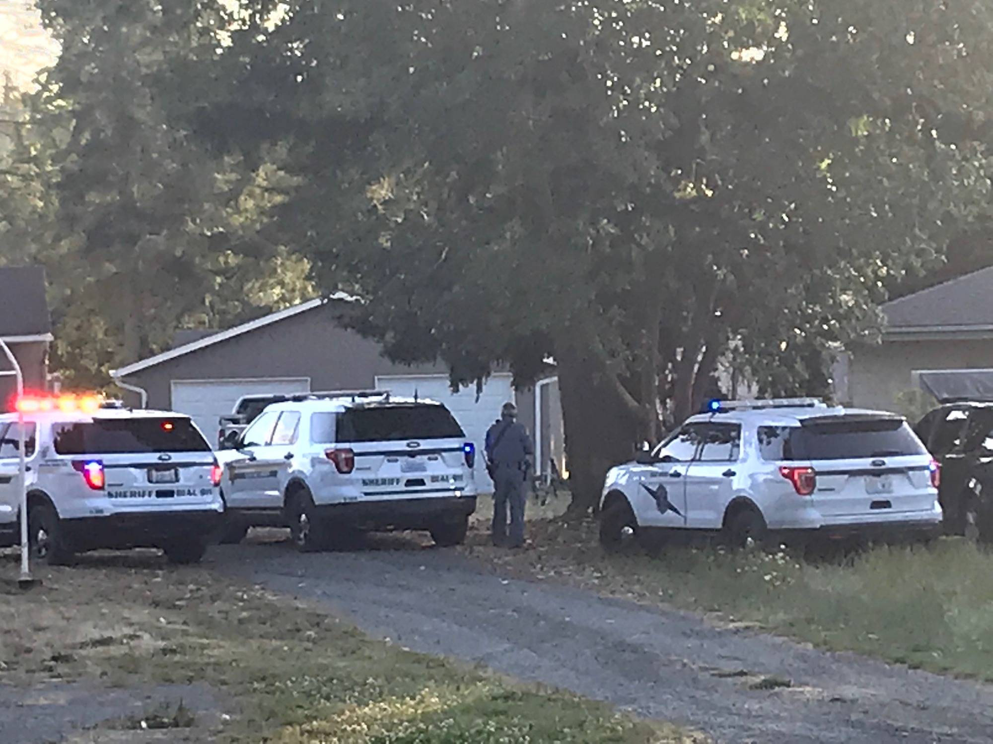 Clallam County Sheriff’s Office deputies and the State Patrol have responded to a disturbance in the 800 block of MountPleasant Road. An armed officer stands outside the residence. (Paul Gottlieb/Peninsula Daily News)