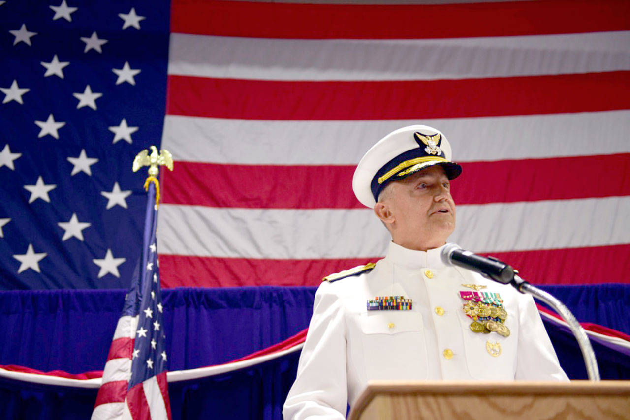 USCG Rear Adm. Anthony J. Vogt addresses guests at a change of command ceremony July 9 at U.S. Coast Guard Base Seattle