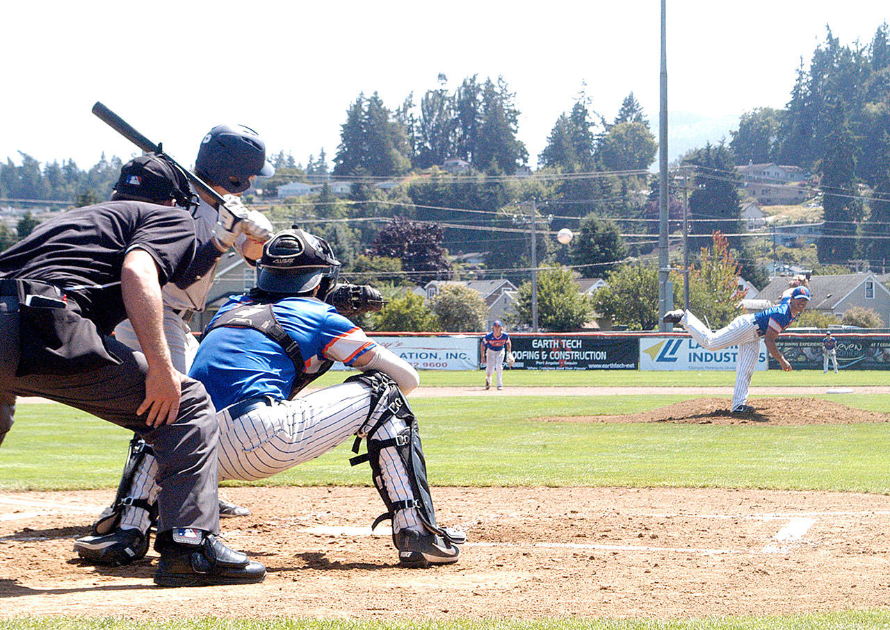 The Lefties Tyler Tan pitches against the Portland Pickles in Sundays game at Civic Field in Port Angeles. (Pierre LaBossiere/for Peninsula Daily News)