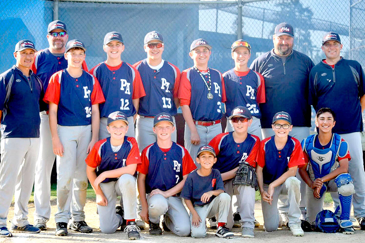 The Port Angeles 12-year-old team beat the Sequim Crosscutters 11-0 on Sunday to win their division at the 22nd annual Dick Brown Memorial Baseball Tournament. From left back row are coach JR Flores, coach Sean Worthington, Cole Beeman, Blake Soulberg, Cole Johnson, Colton Romero, Rylan Politika, coach Adam Johnson and coach Aaron Strohauer. From left, front row, are Austin Worthington, Tate Alton, bat boy Leighton Flores, Jordan Shumway, Alex Angevine and Phoenix Flores.