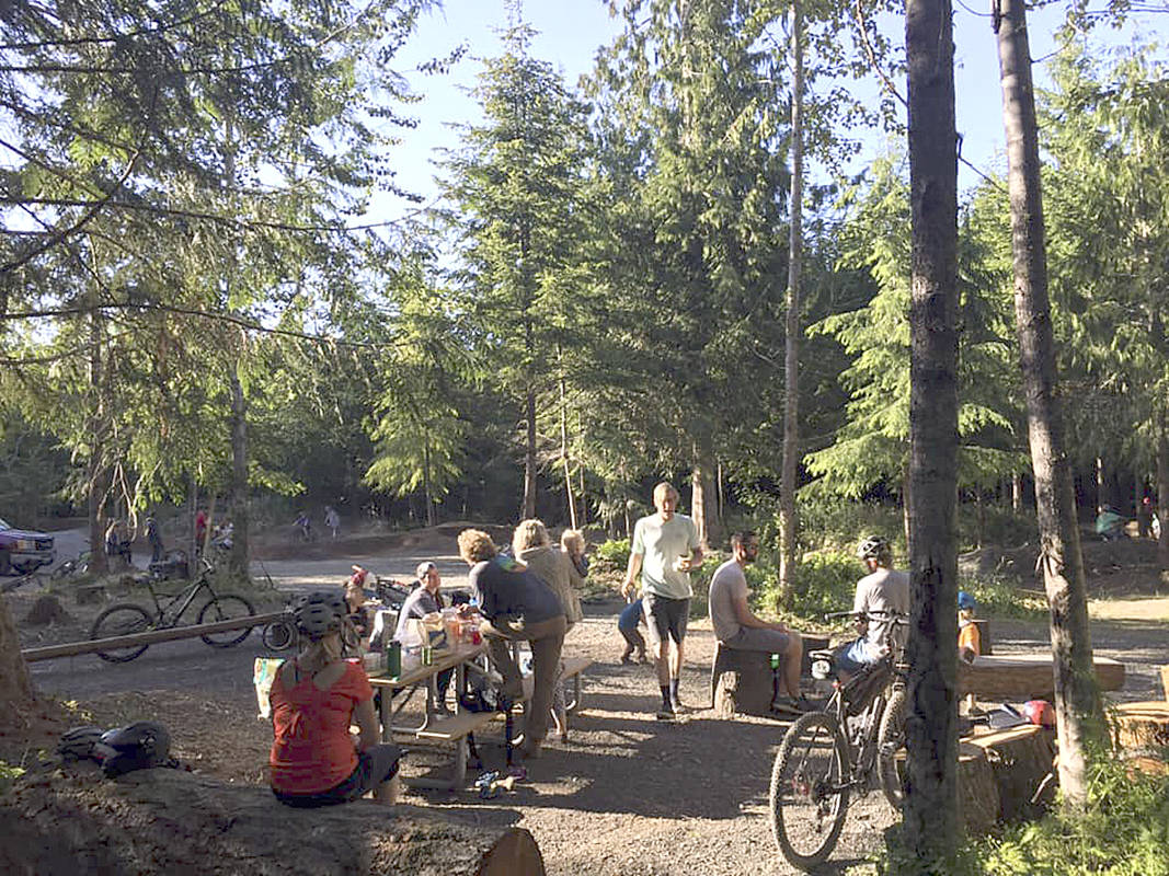 Top Left Trails Co-Op Mountain bikers enjoy a picnic at Central Zone area of the Colville Mountain Bike Skills Park near Port Angeles. The park will host an open house from 10 a.m. to 2 p.m. Saturday.