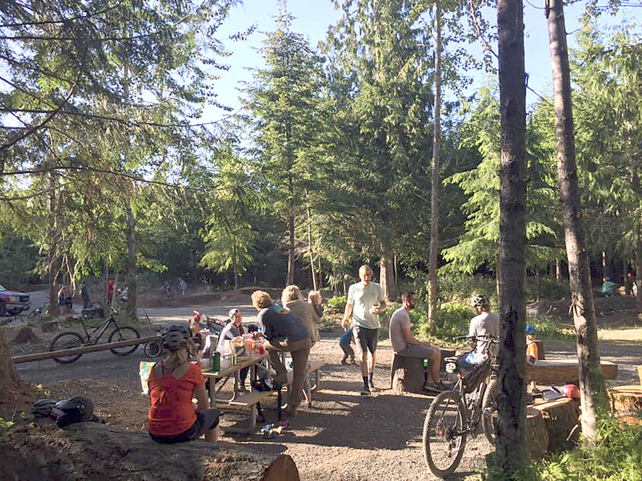 Top Left Trails Co-Op Mountain bikers enjoy a picnic at Central Zone area of the Colville Mountain Bike Skills Park near Port Angeles. The park will host an open house from 2 p.m. to 4 p.m. Saturday.