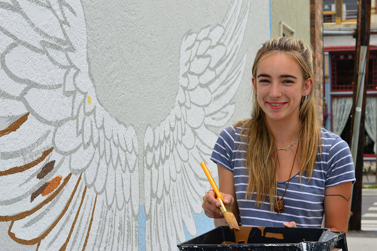 Nora Kingsley is nearly finished with her mural in downtown Port Townsend. The recent high school graduate devoted much of this year to working through the permissions process for the public-private interface where it’s located. (Diane Urbani de la Paz/for Peninsula Daily News)