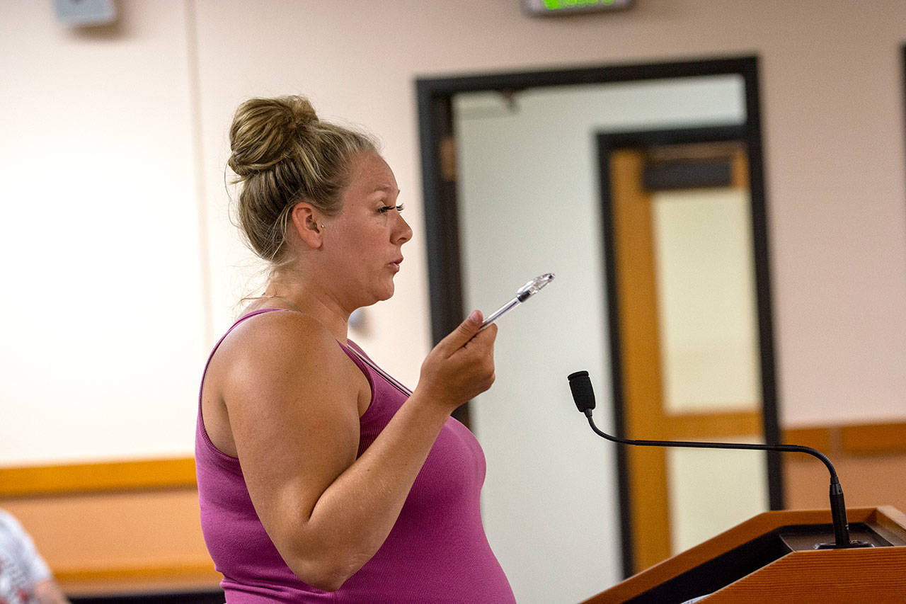 Katrina Haymaker, owner of Midway Metals, addresses the Clallam County Hearing Examiner during a hearing Thursday. (Jesse Major/Peninsula Daily News)