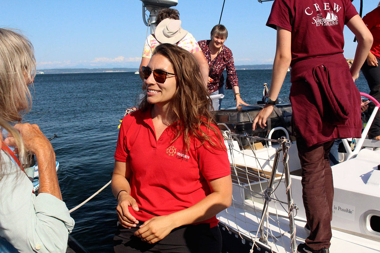 Sequim resident and daughter of Port Townsend High School teacher Mackenzie Marmol helped the public board and tour the boat. She is a guest crew member until it reaches San Francisco on Monday. (Zach Jablonski/Peninsula Daily News)