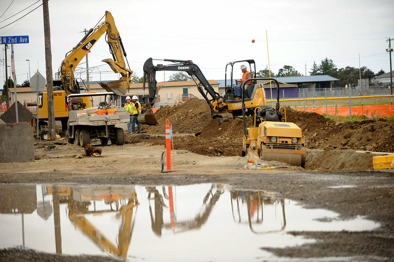 This week, Interwest Construction workers plan to complete underground utility work before moving onto sidewalk work along West Fir Street. (Matthew Nash/Olympic Peninsula News Group)