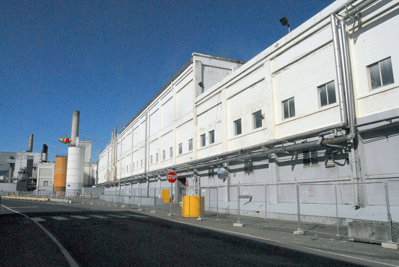Work is underway to retool portions of the McKinley Paper Co. mill in Port Angeles with a targeted opening by Dec. 31. (Keith Thorpe/Peninsula Daily News)